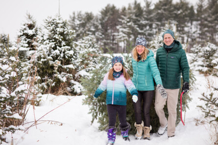 family photo in christmas tree farm